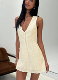 Sylvara Textured Button Up Romper Yellow